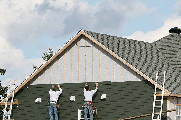 Professional Siding Installation technician working in Danville, OH
